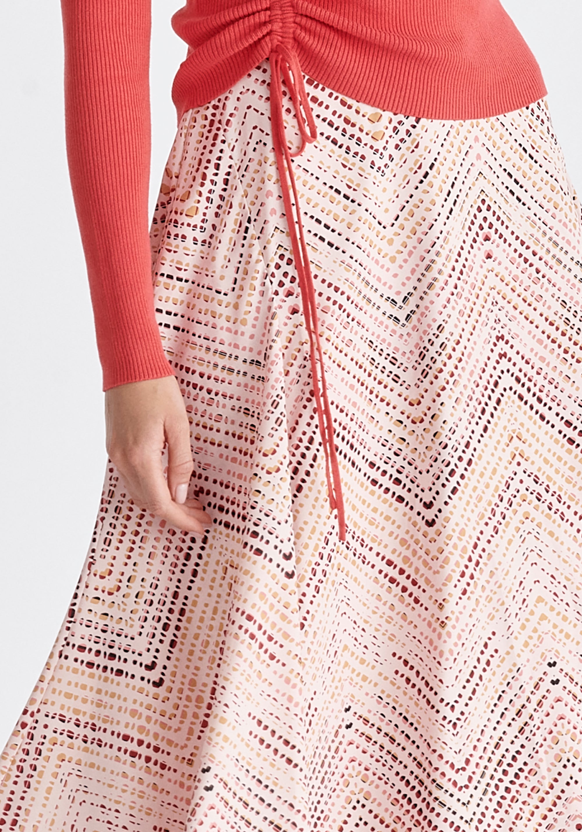 Asymmetric Hem Skirt in Pink, Red, Black and Cream Close Up