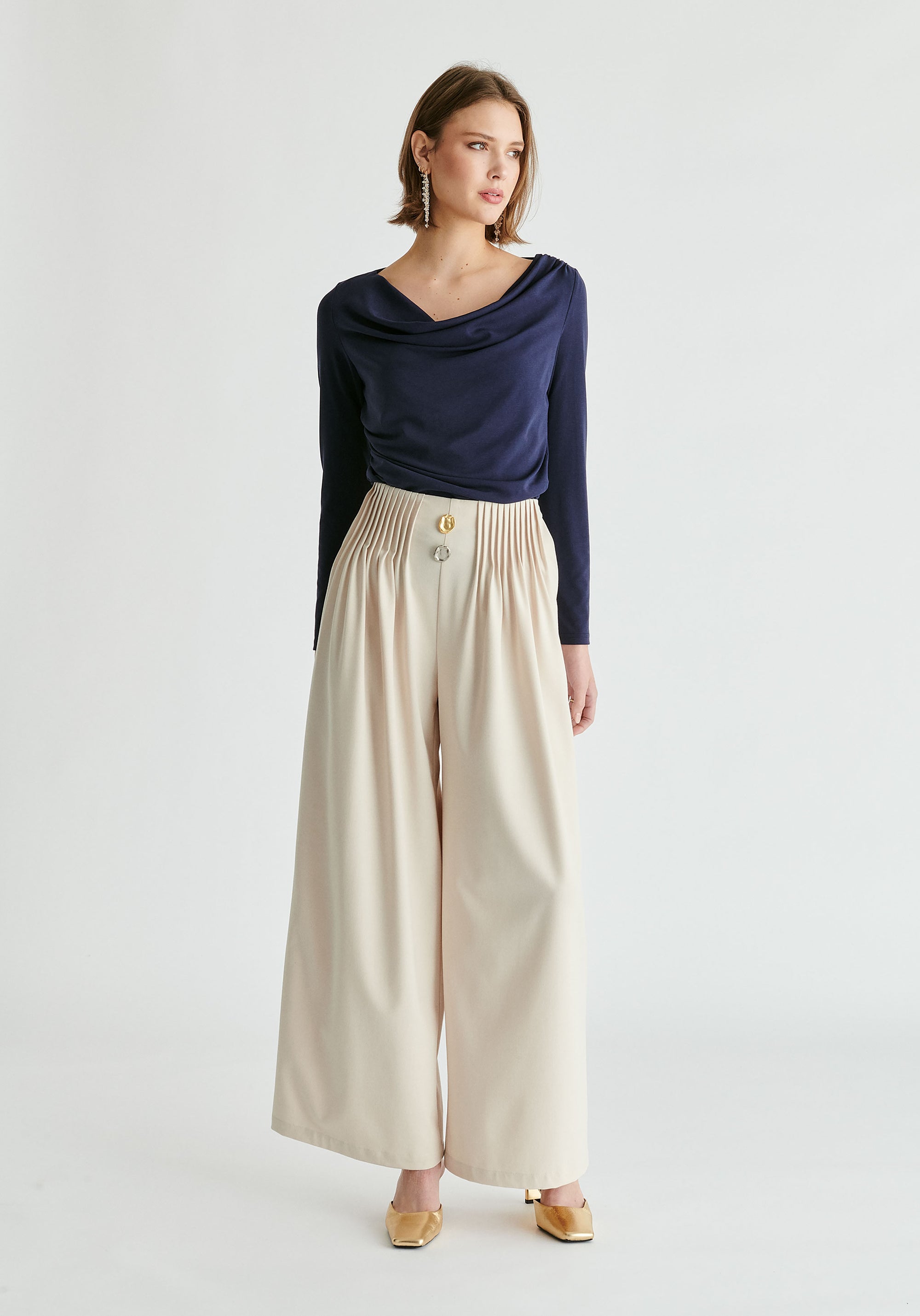Wide Leg Trousers with Pleated Waist Detail in Cream Front