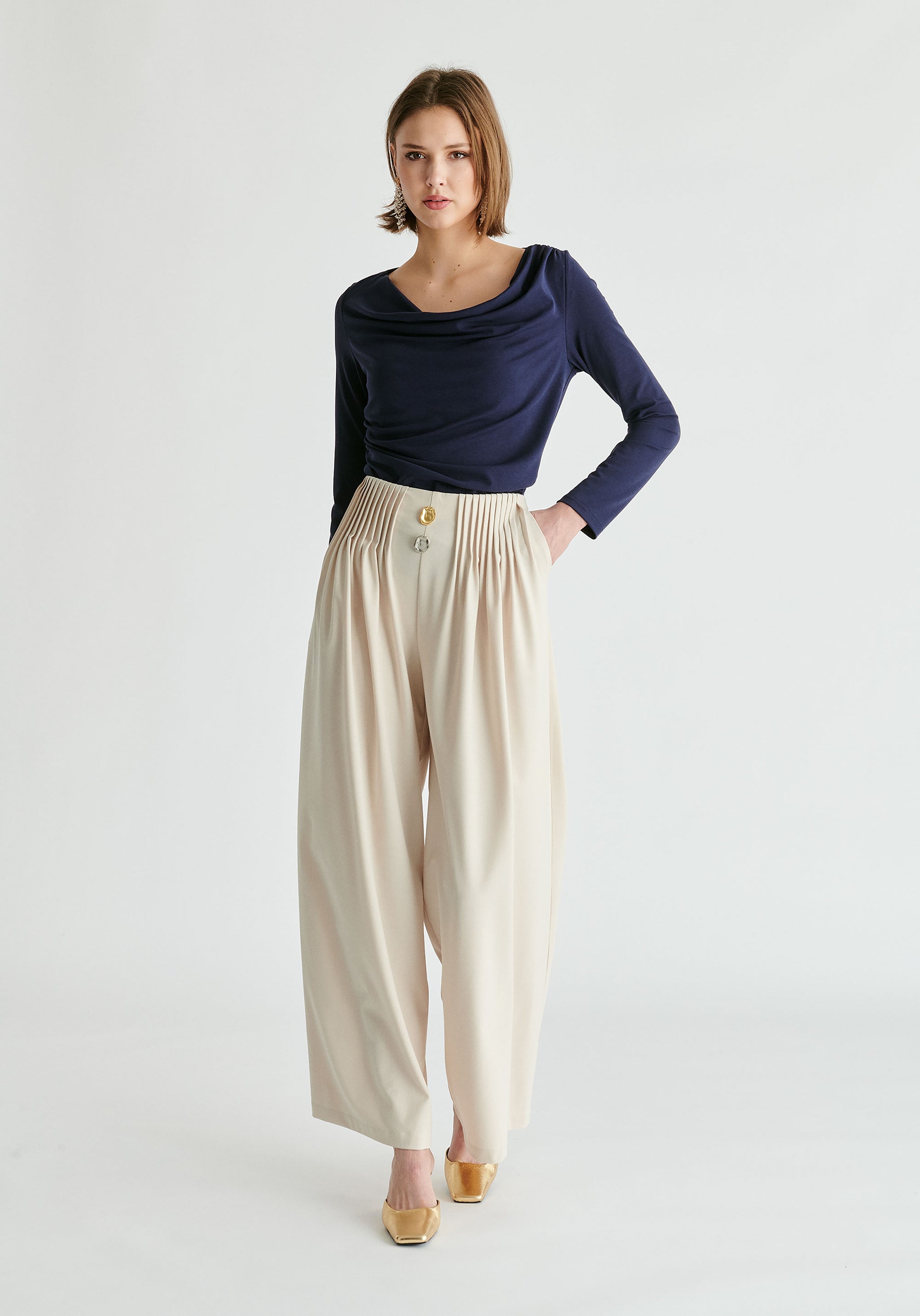 Wide Leg Trousers with Pleated Waist Detail in Cream Front