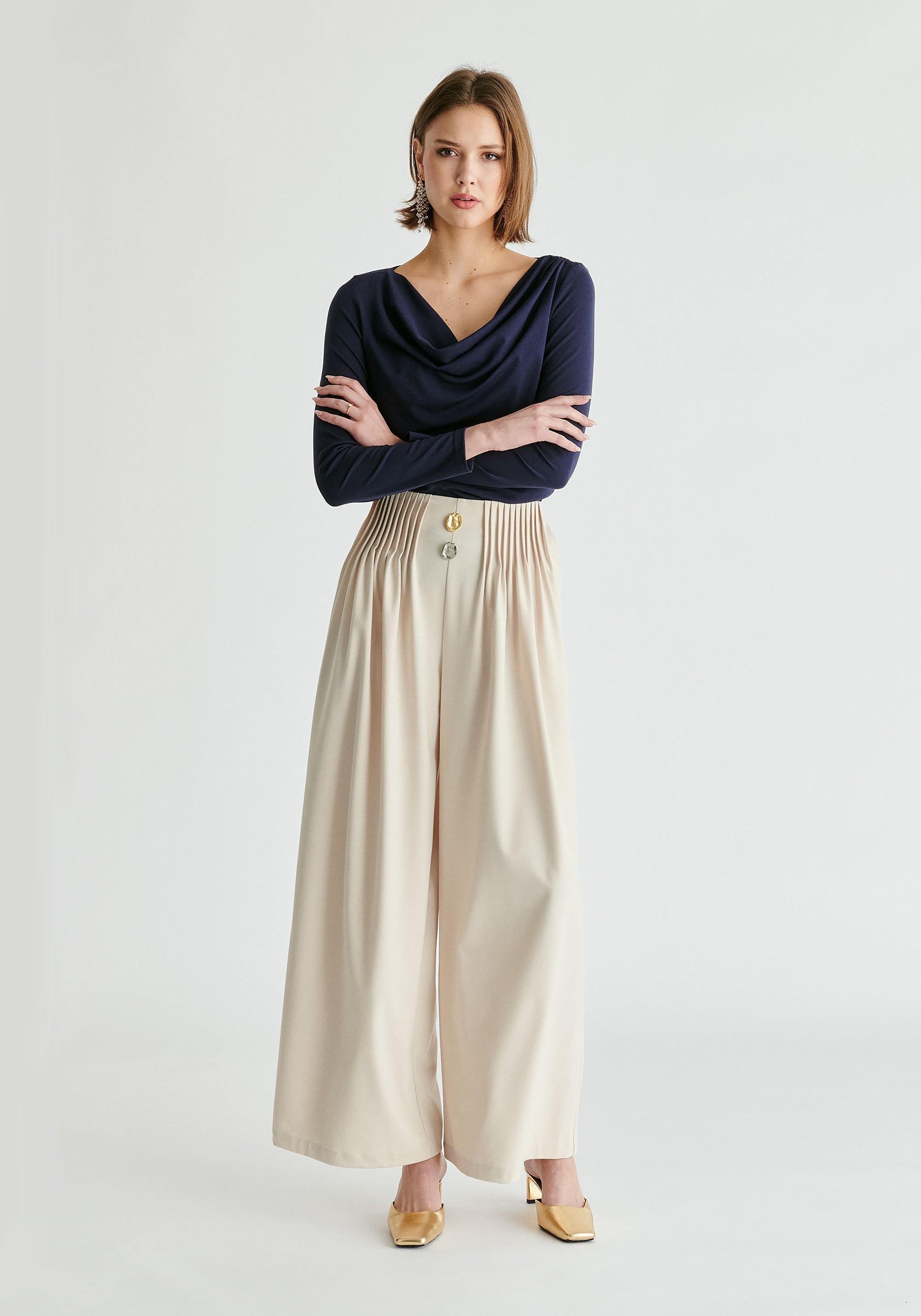 Wide Leg Trousers with Pleated Waist Detail in Cream Front