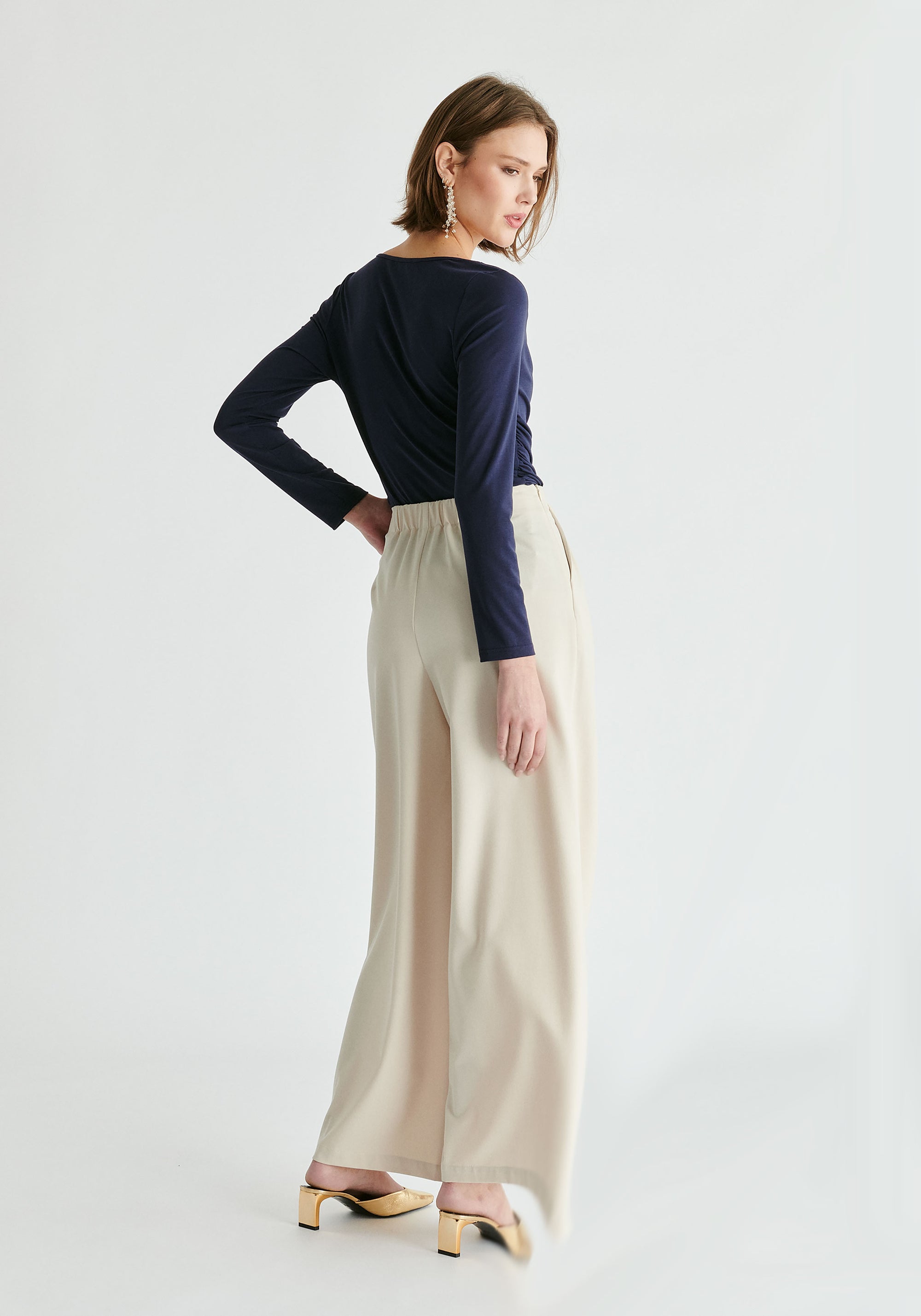 Wide Leg Trousers with Pleated Waist Detail in Cream Back