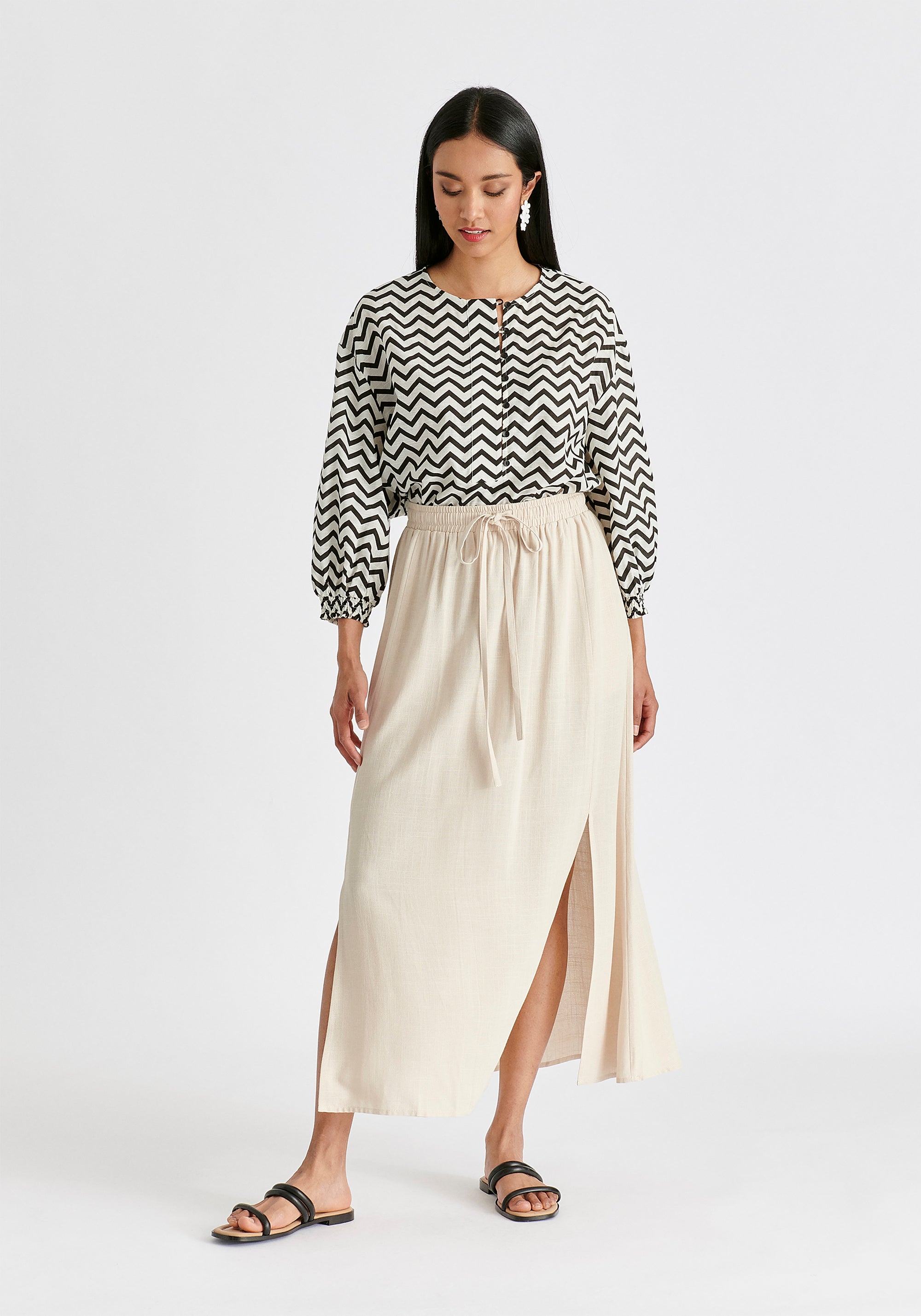 Buttoned Mid Sleeve Top in Zigzag Pattern in White and Black Front