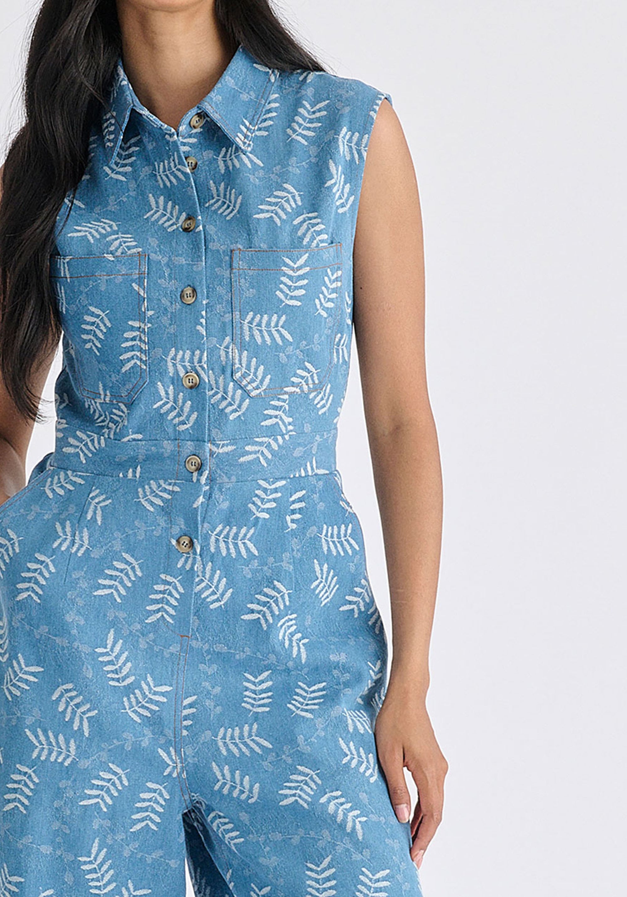 Wide Leg Denim Jumpsuits in Leaf Pattern in Light Denim Blue Closeup