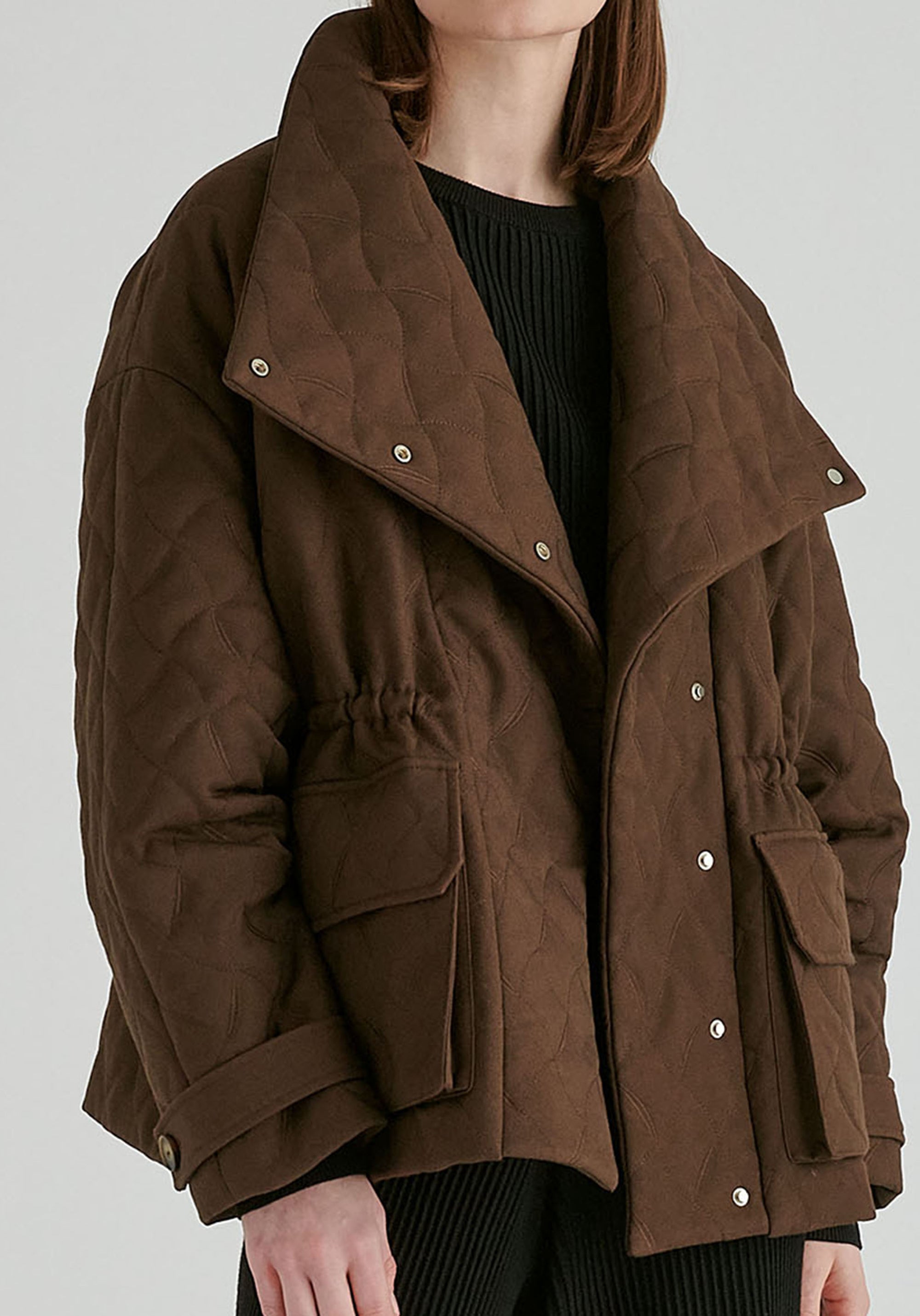 Double Breasted Diamond Quilted Utility Jacket Drawstring Waist in Brown Closeup