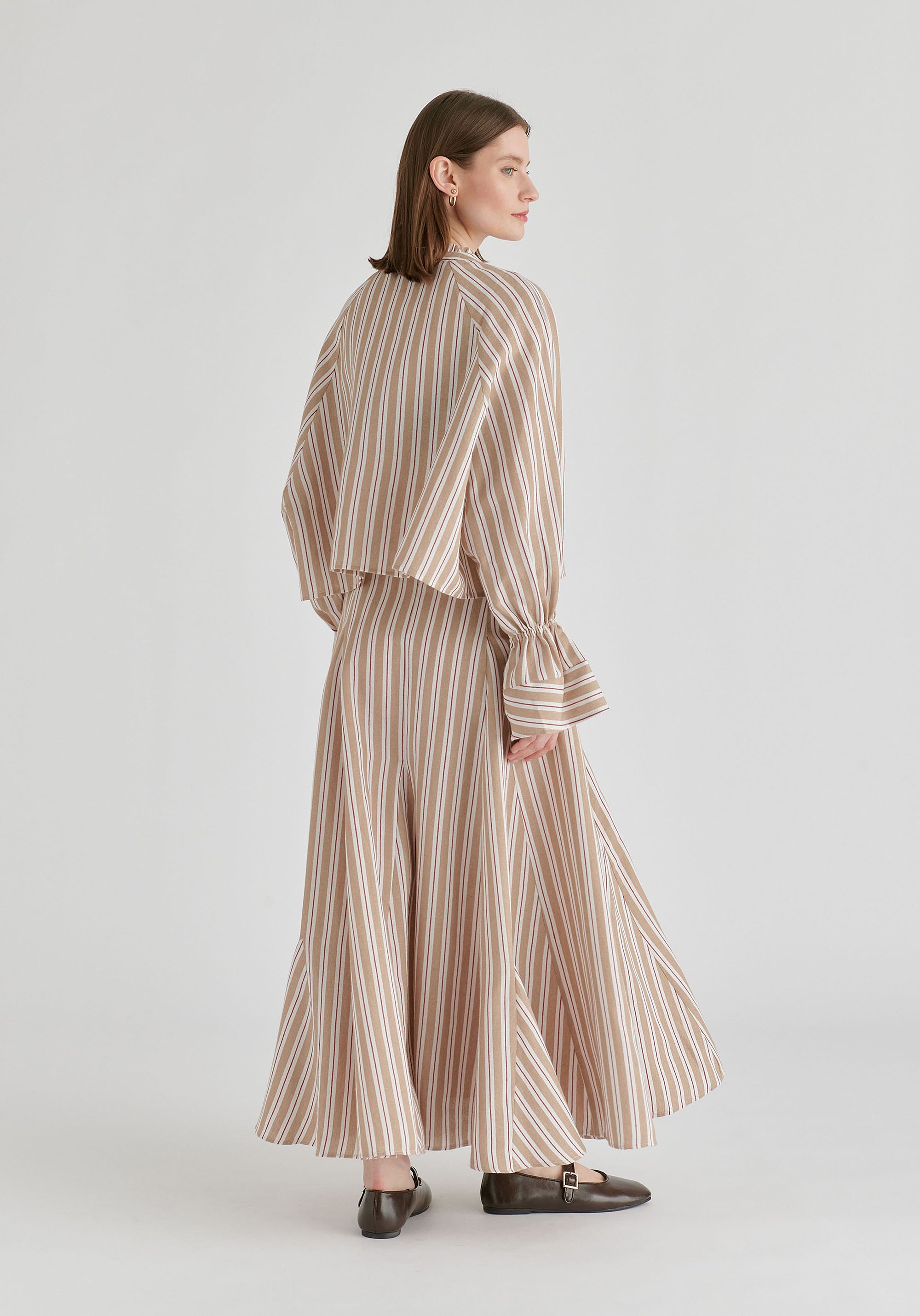 Ruffle Round Neck Blouse with Cinch Wrist Detail in Stripes