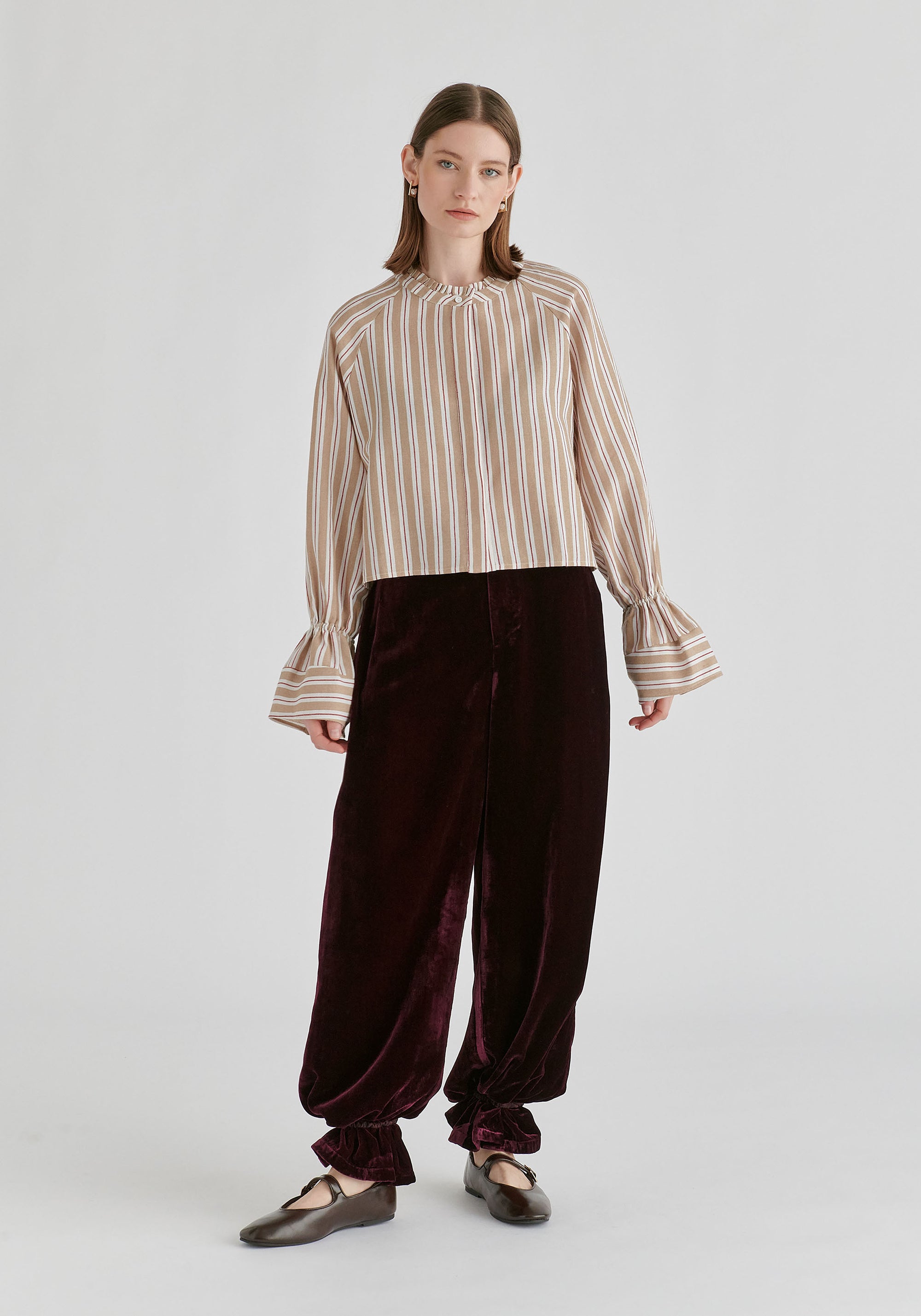 Ruffle Round Neck Blouse with Cinch Wrist Detail in Stripes