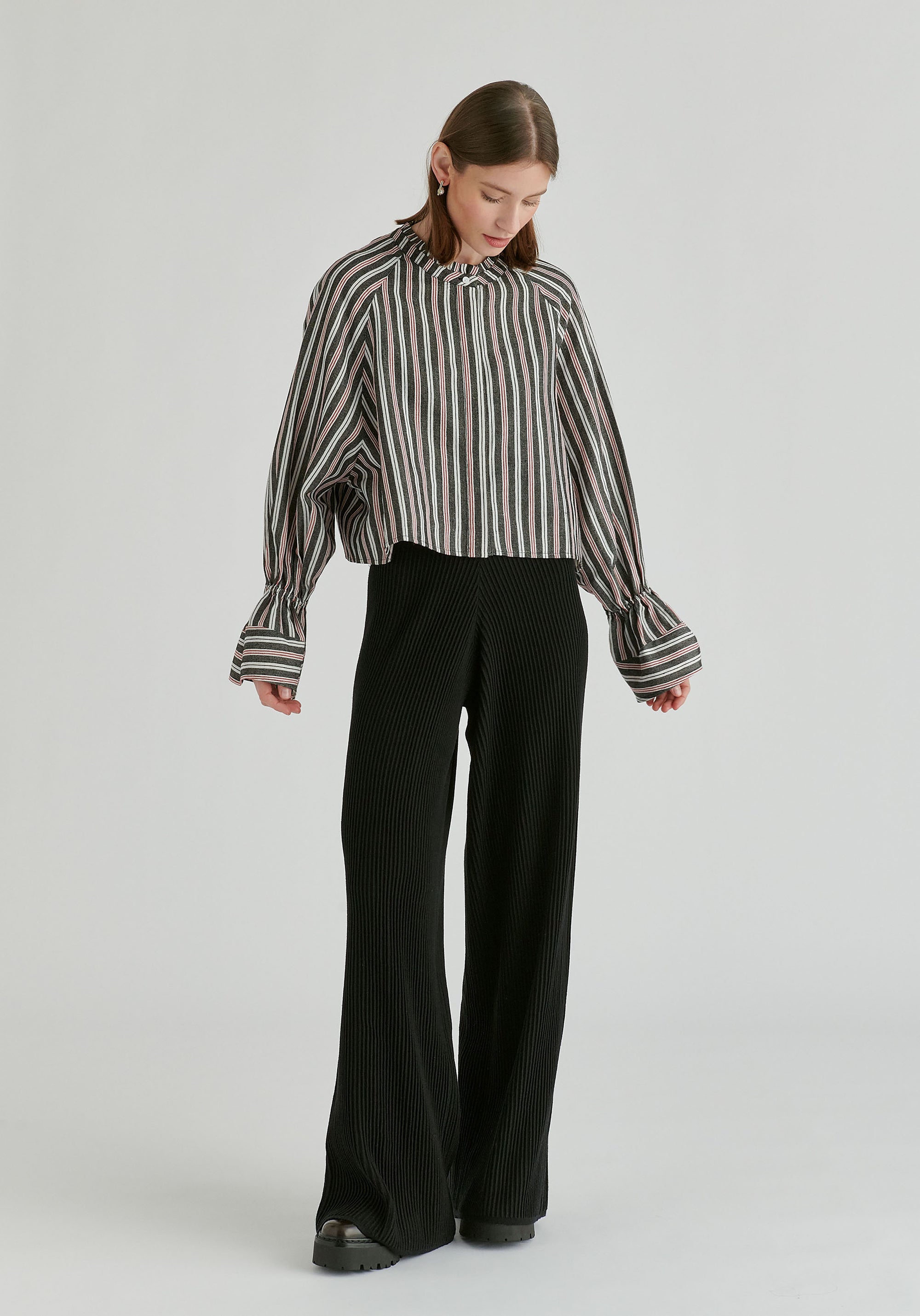 Ruffle Round Neck Blouse with Cinch Wrist Detail in Black Stripes Front