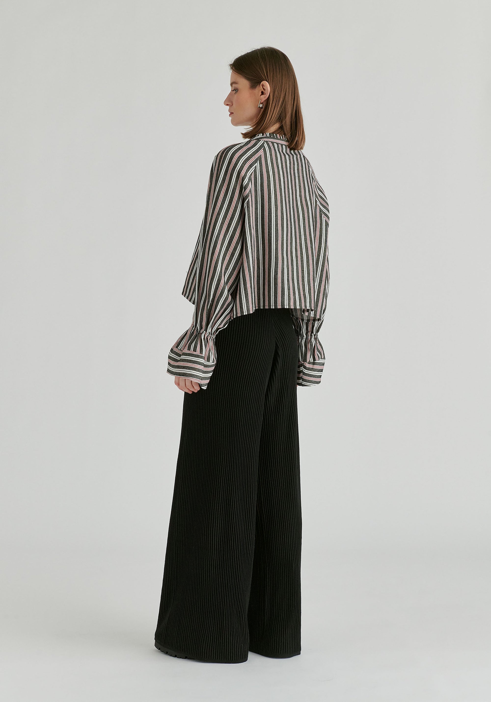 Ruffle Round Neck Blouse with Cinch Wrist Detail in Black Stripes Back