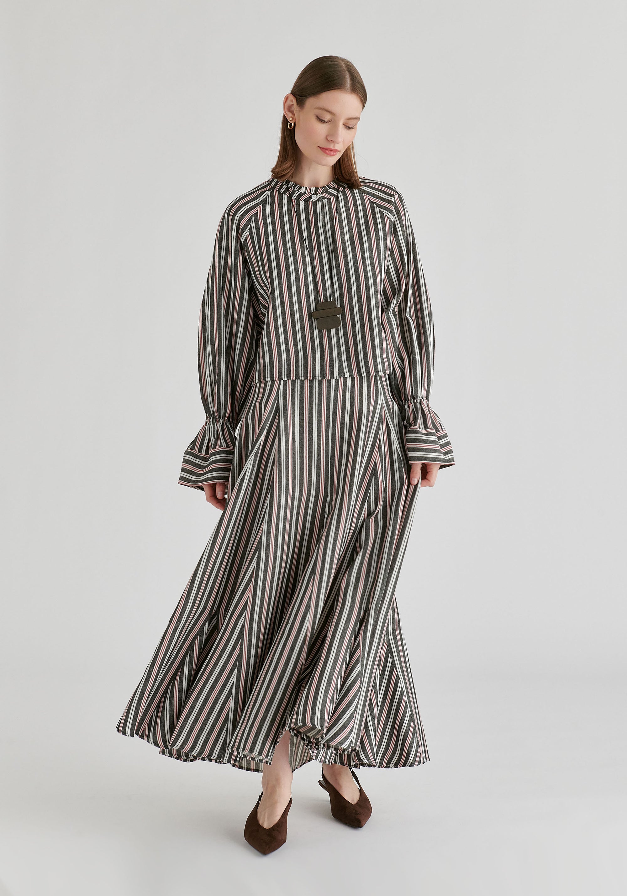 Ruffle Round Neck Blouse with Cinch Wrist Detail in Black Stripes Front