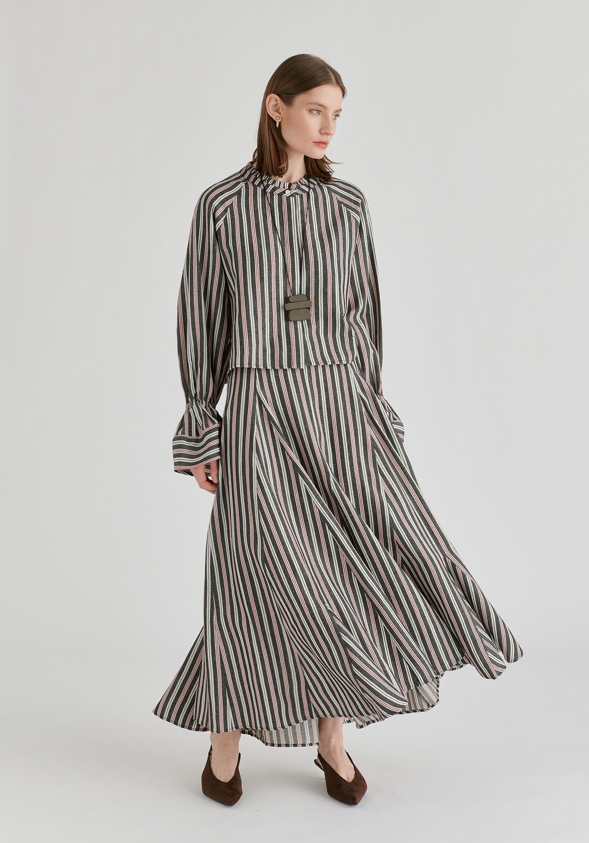 Ruffle Round Neck Blouse with Cinch Wrist Detail in Black Stripes Front
