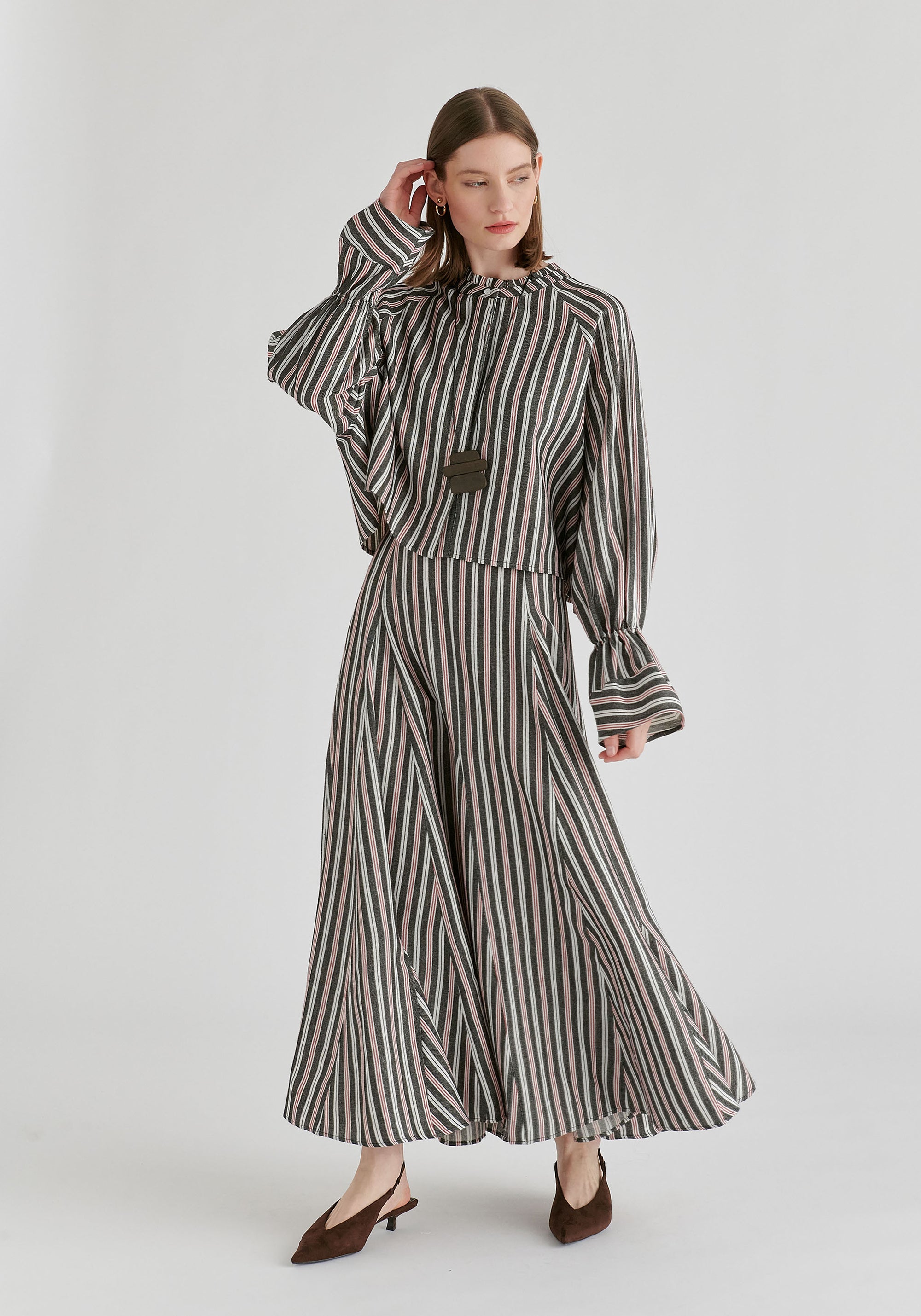Ruffle Round Neck Blouse with Cinch Wrist Detail in Black Stripes Front