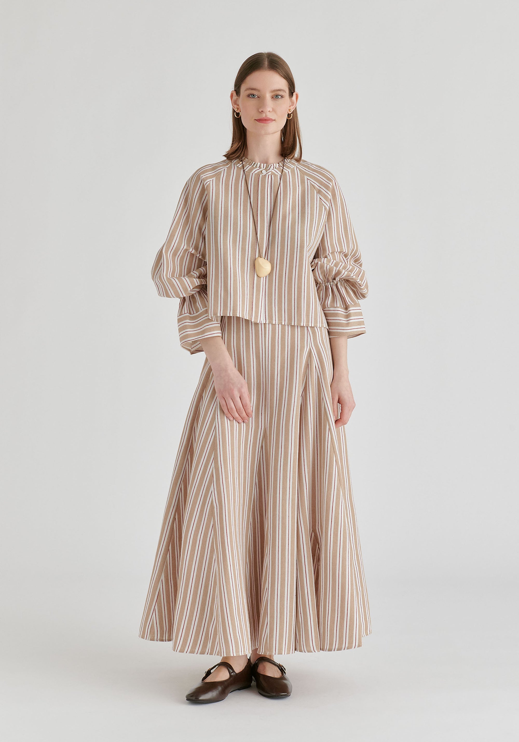 Striped Flared Maxi Skirt with Godet Paneling in Beige Stripes Front