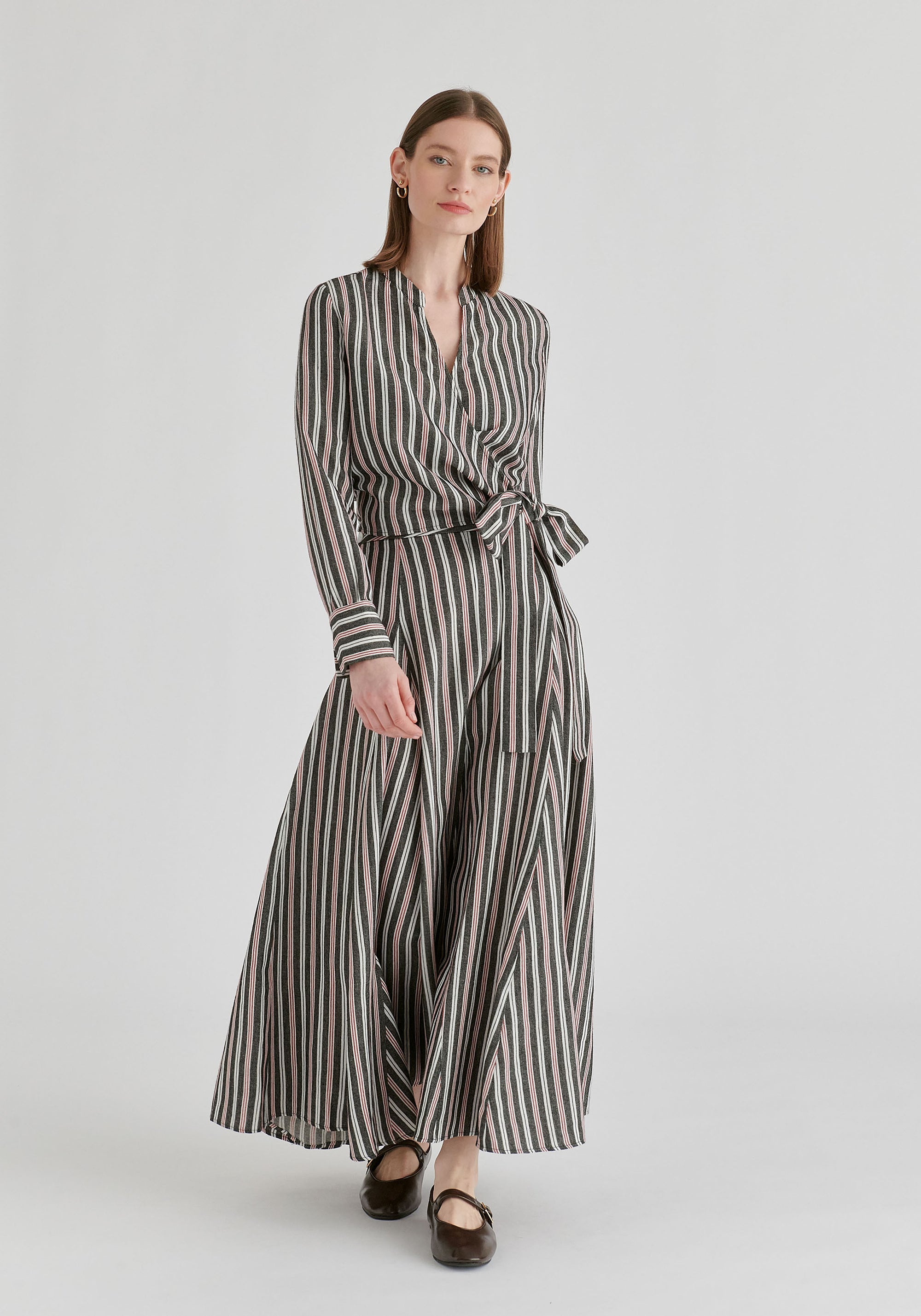 Striped Flared Maxi Skirt with Godet Paneling in Black Stripes Front