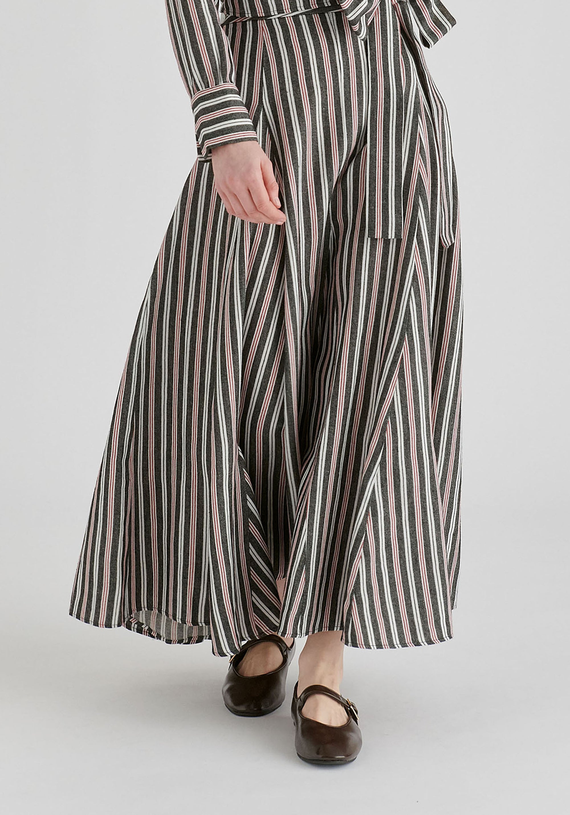 Striped Flared Maxi Skirt with Godet Paneling in Black Stripes Closeup