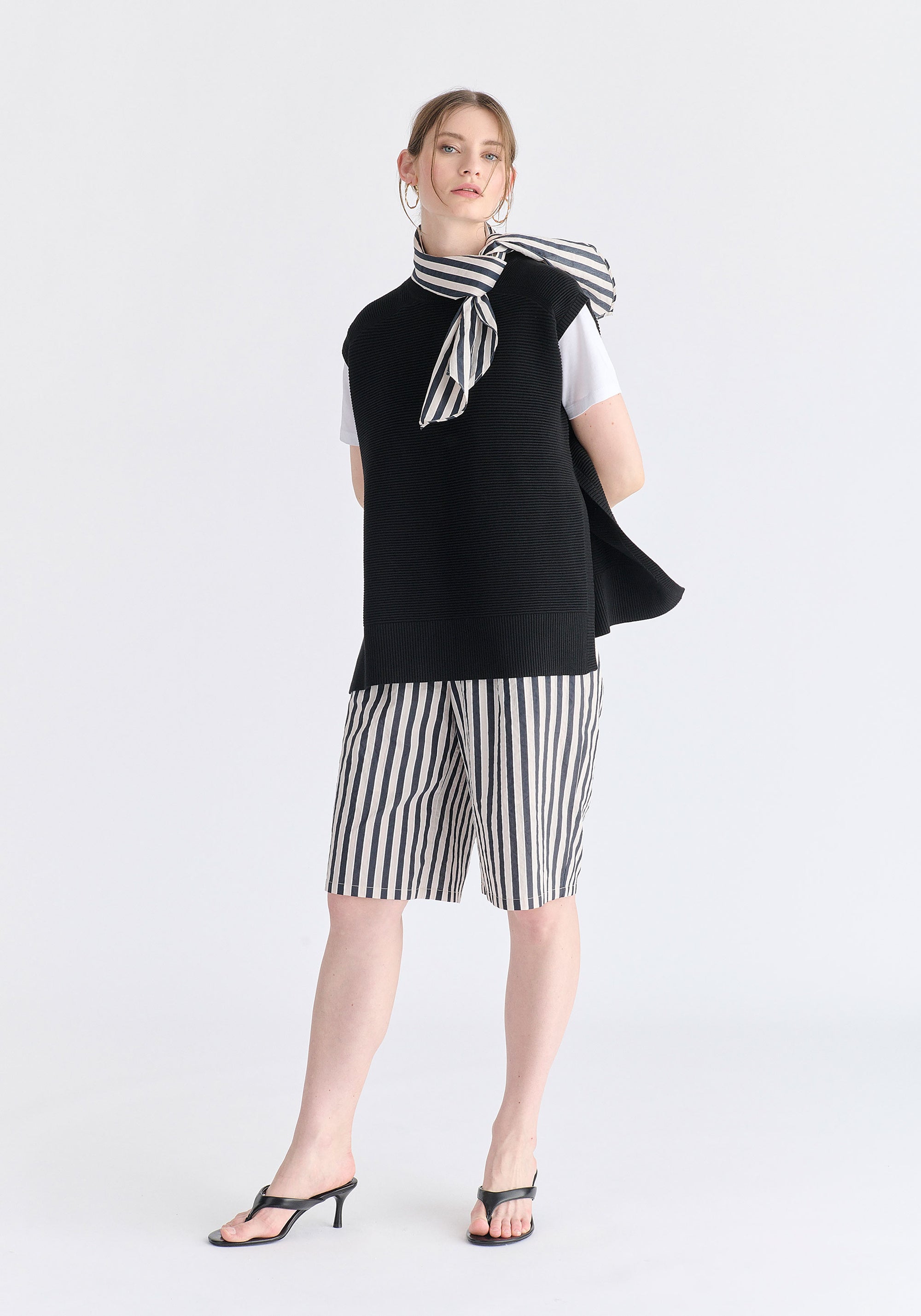 Side Slit Sleeveless Ribbed jumper in Black Front