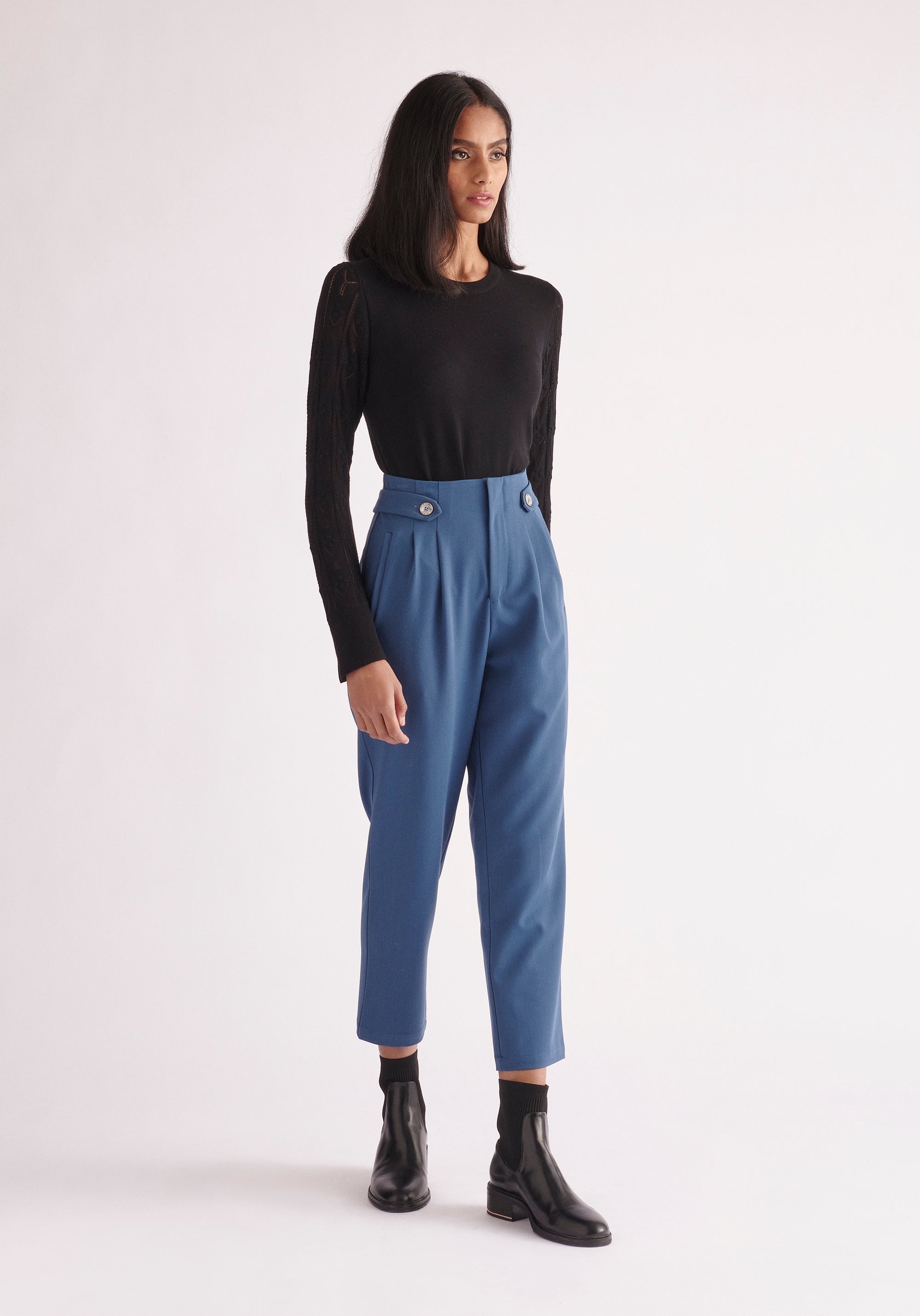 Paisie Pointelle Sleeve Knitted Top in Black