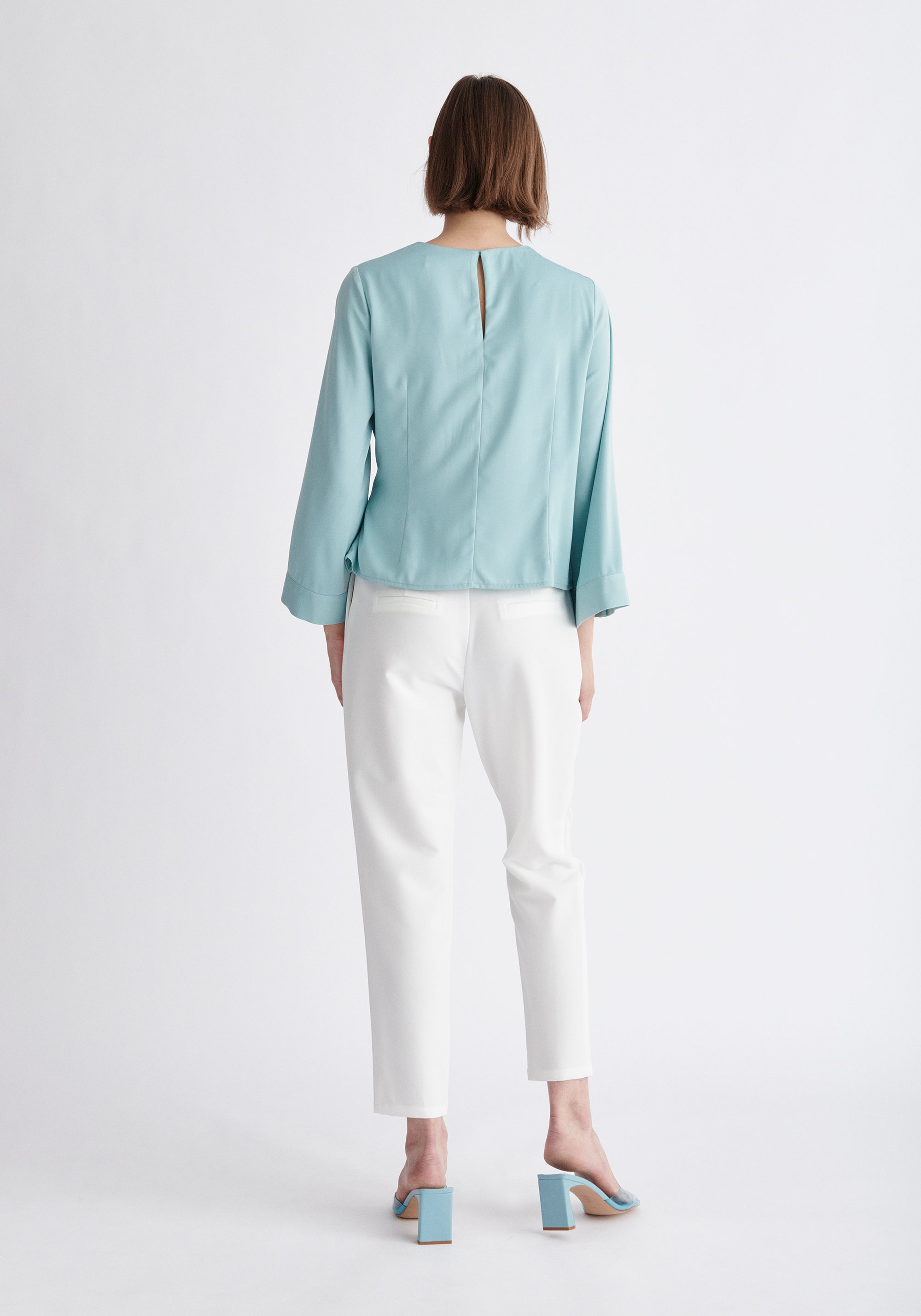 Paisie Wrap Top with Cape Sleeves in Light Teal and White Back