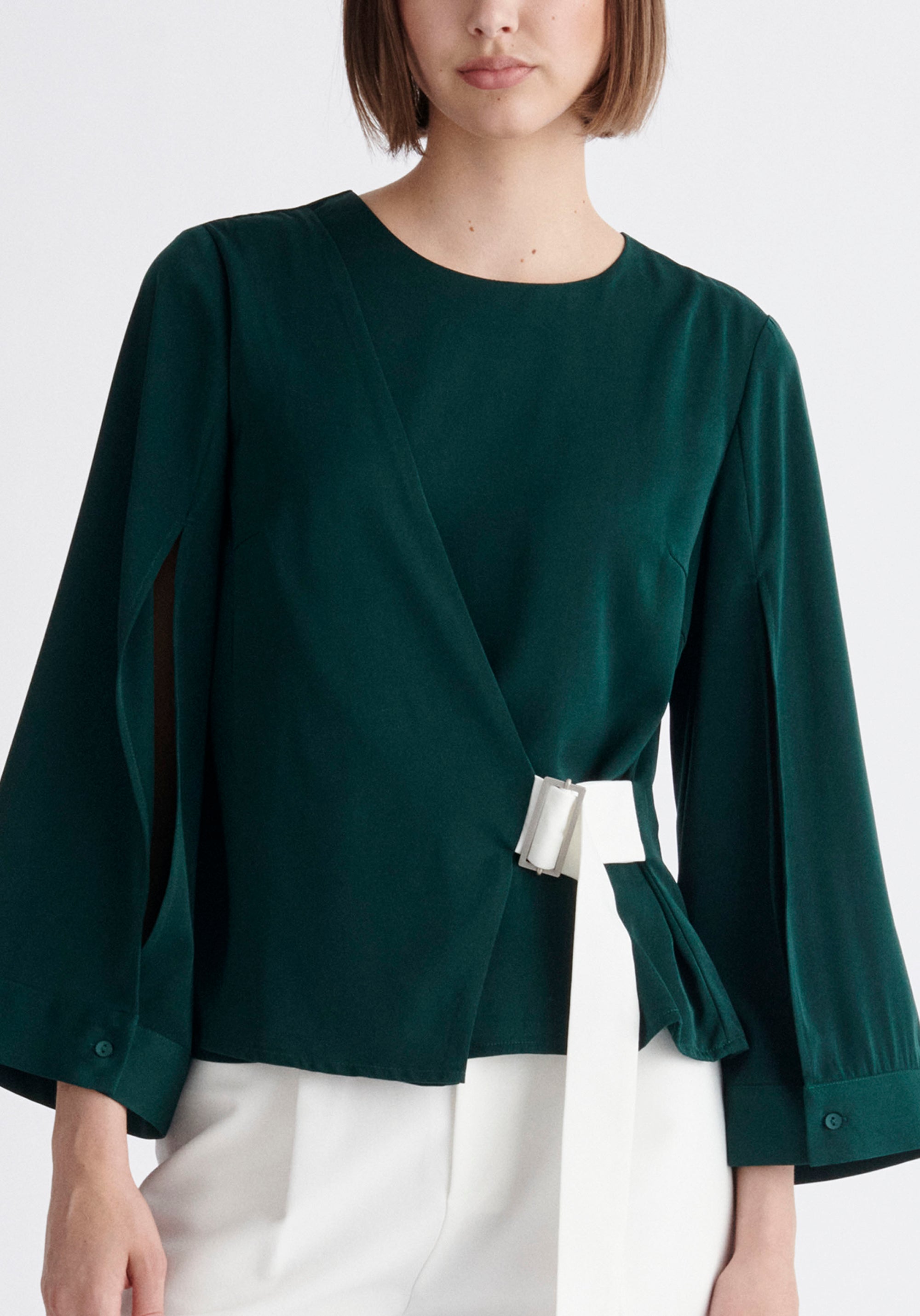 Paisie Wrap Top with Cape Sleeves in Dark Green and White Close Up