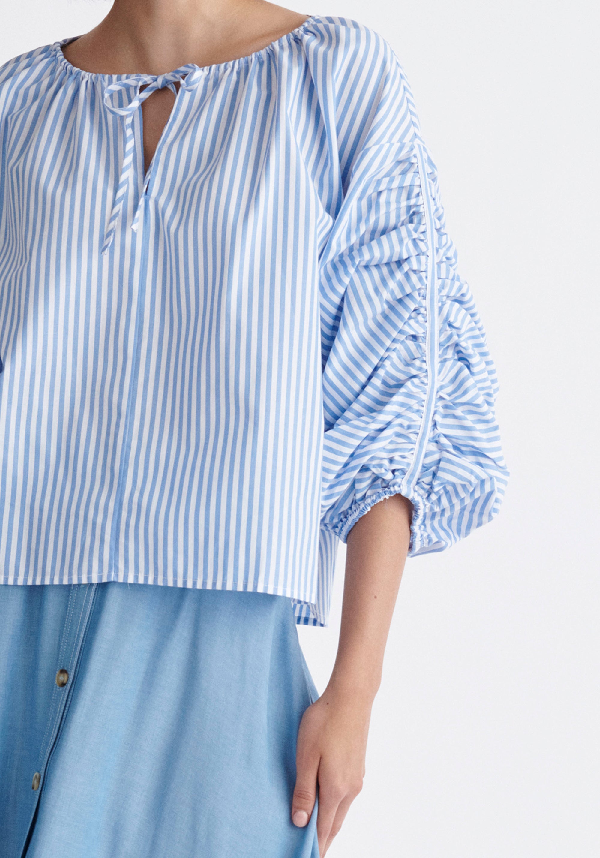 Paisie Striped Ruched Sleeve Top in Light Blue and White Close Up