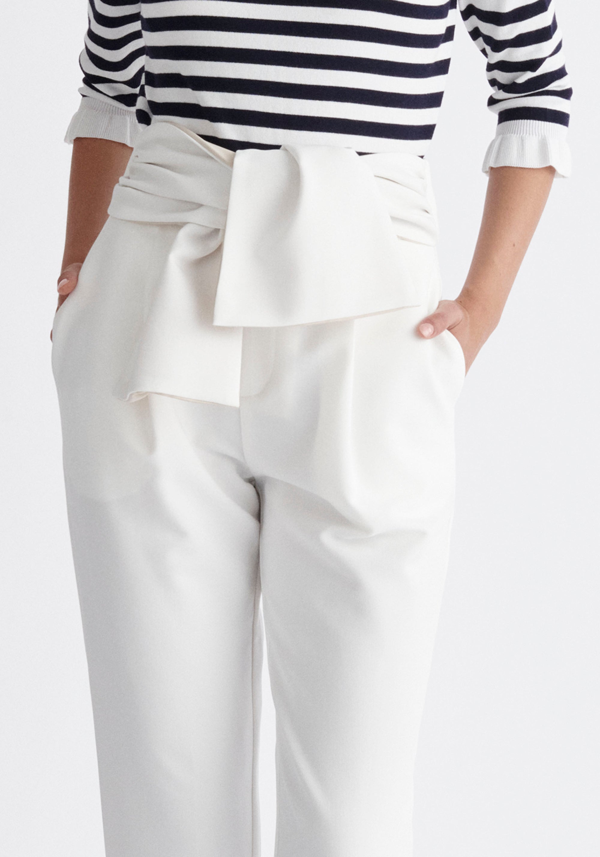 Paisie Waist Tie Peg Leg Trousers in White Close Up