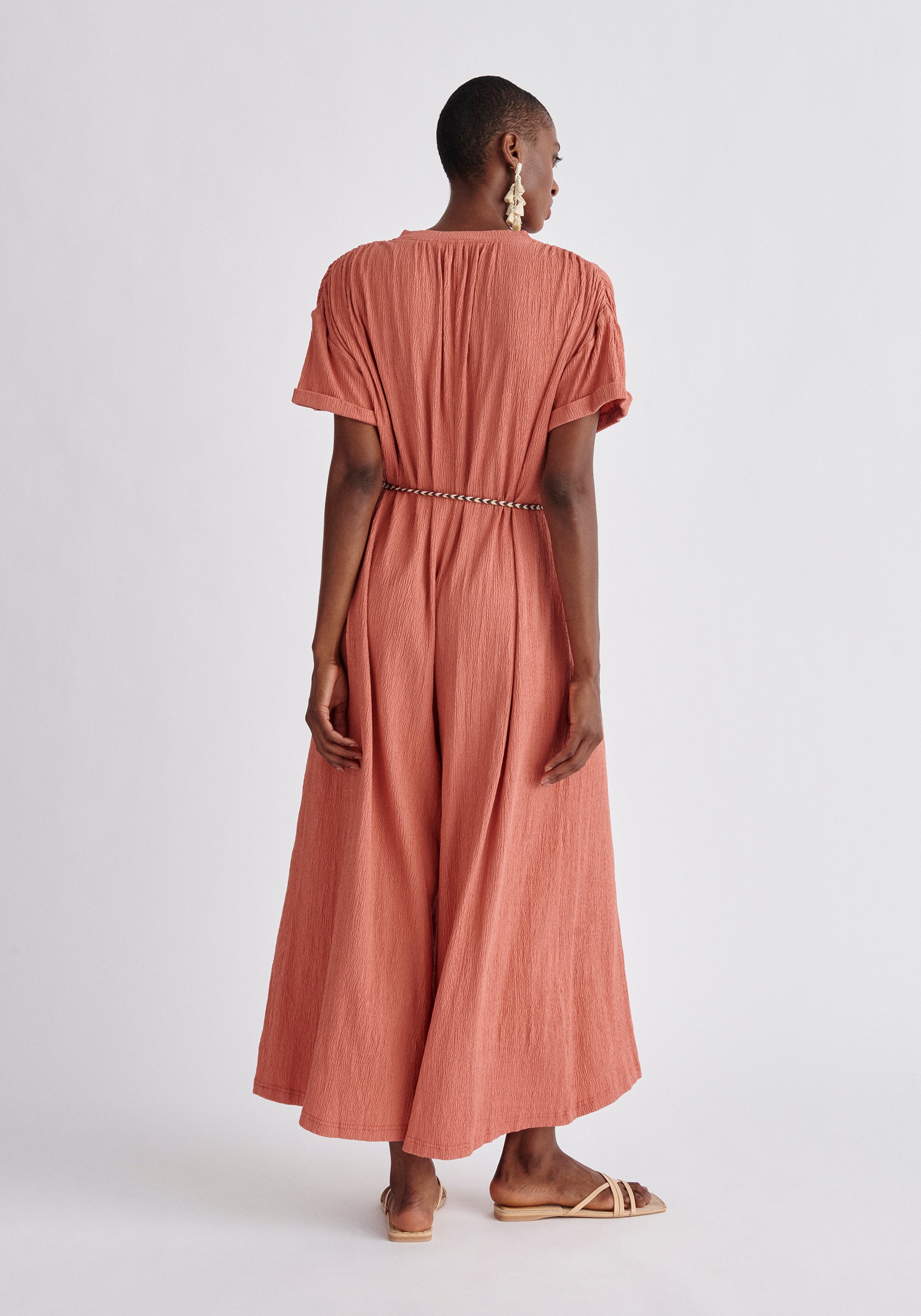 Paisie Belted Button Jumpsuit in Pink Back