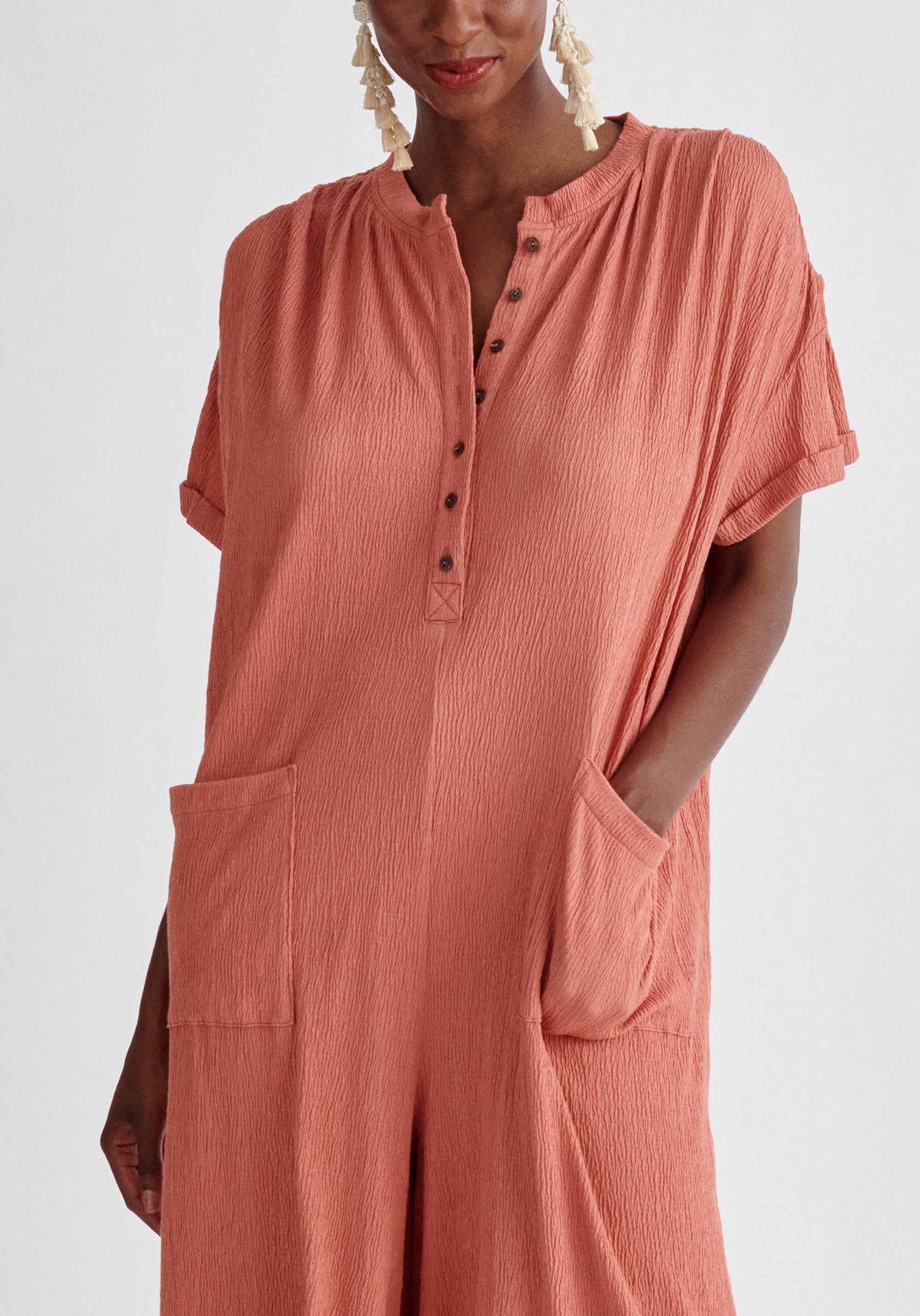 Paisie Belted Button Jumpsuit in Pink Close Up
